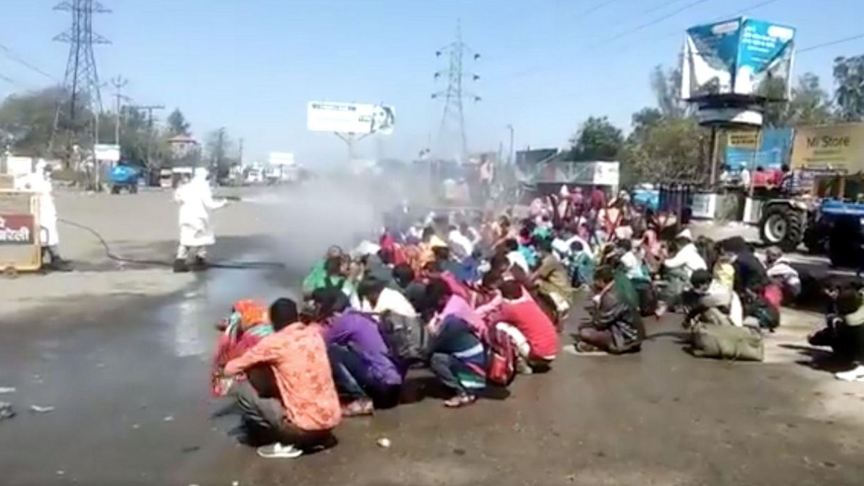 Shocking video emerges of Indian authorities spraying civilians with 'bleaching powder' to 'disinfect' coronavirus germs