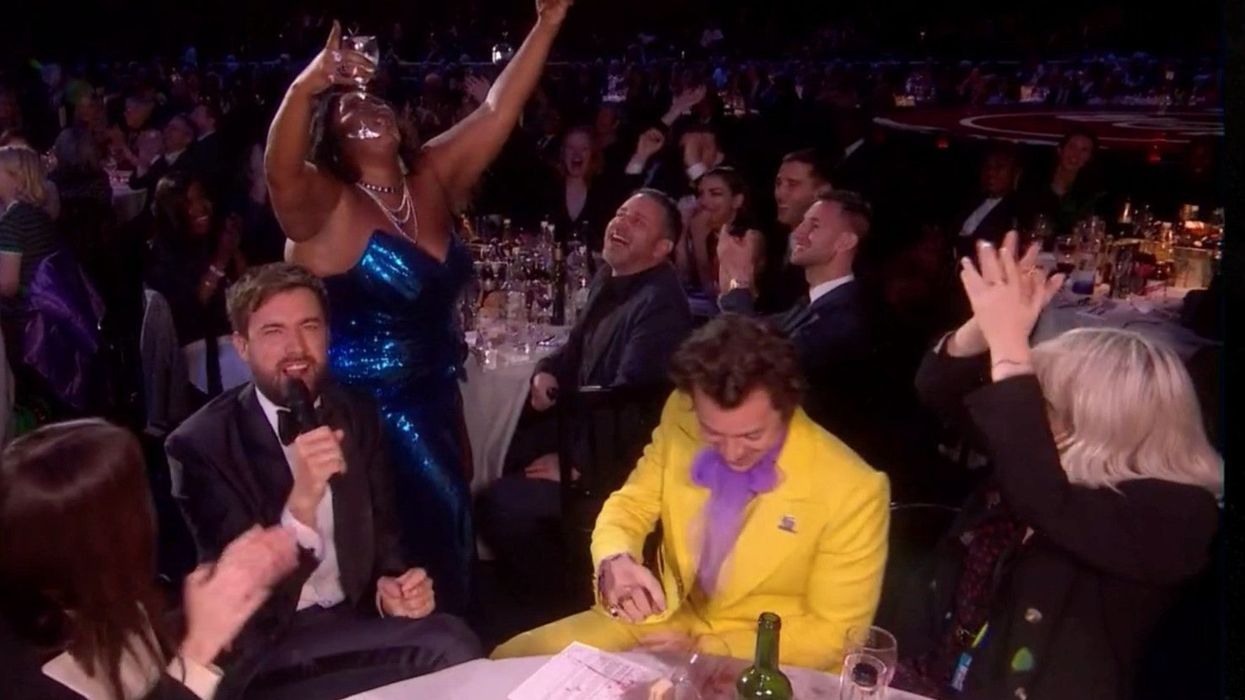 This moment between Harry Styles, Lizzo and a glass of tequila is the best thing that happened at the Brits