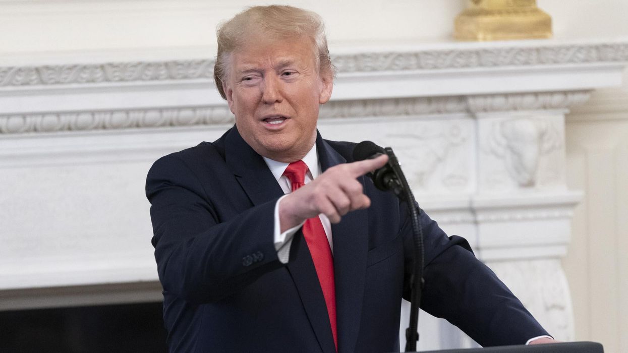 Trump says that the EU was created to treat the US 'badly' and that coronavirus 'will go away in April'