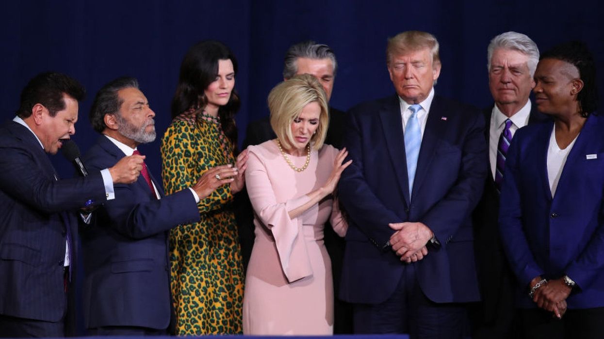 'God' denies he is on the side of Trump after supporters pray for the president