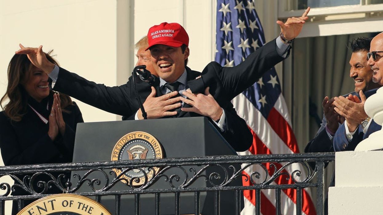 Trump cups baseball player's chest in very awkward moment