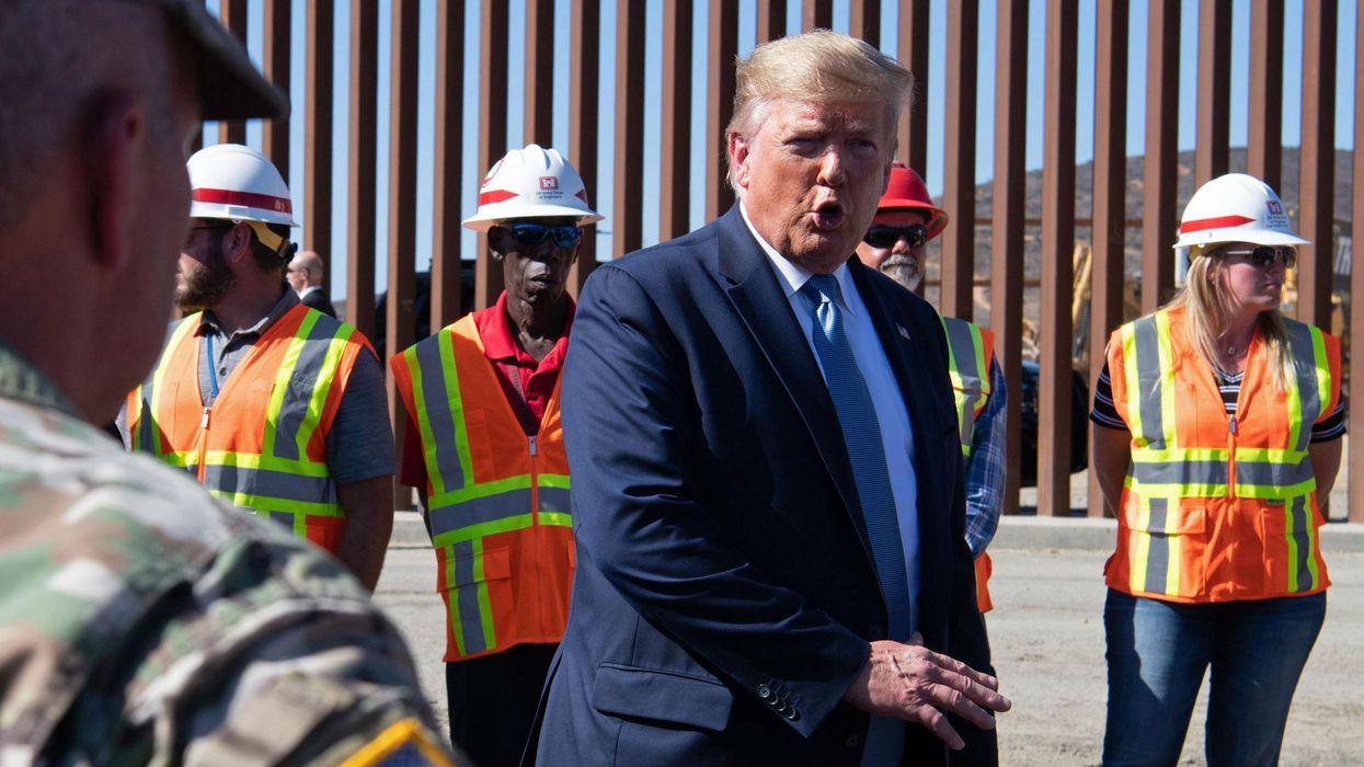 Trump says his border wall is 'so hot you can fry an egg on it' before signing it