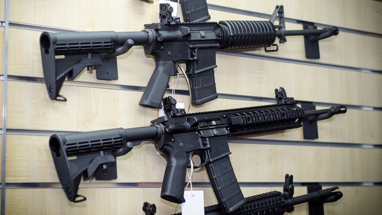 Resurfaced photo of man carrying assault rifle in Starbucks divides the internet