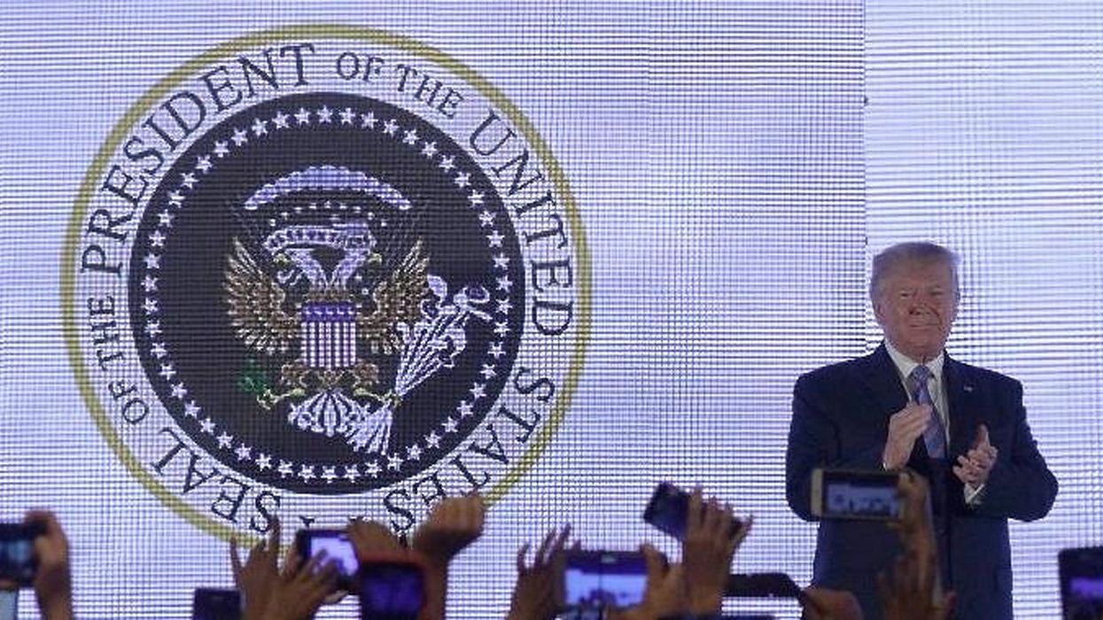 Trump mocked after appearing in front of fake presidential seal at conservative teen summit