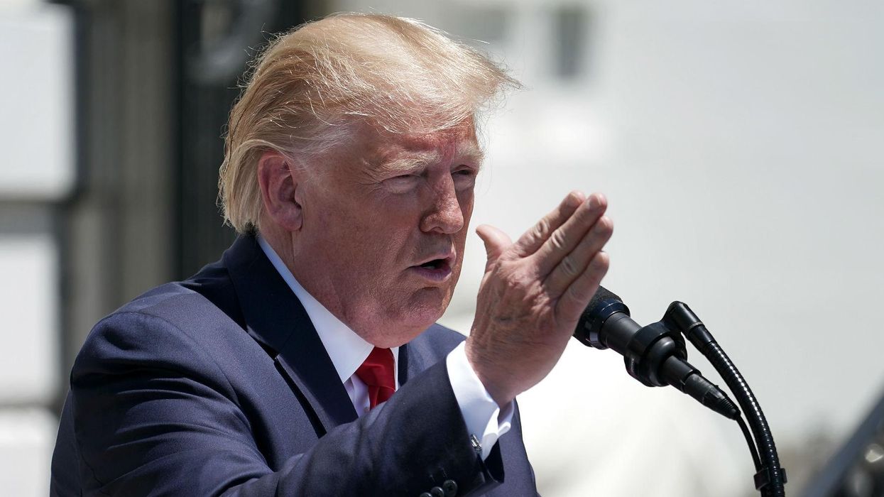 Trump says that his tweets aren't racist because 'many people' agree with him