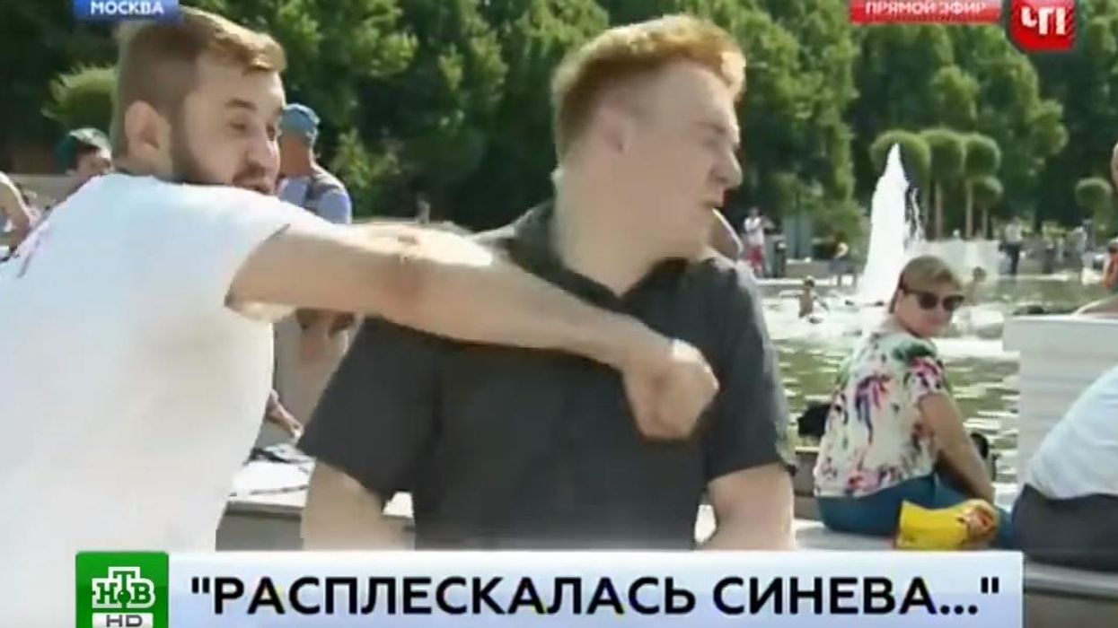 The shocking moment a reporter is punched live on air