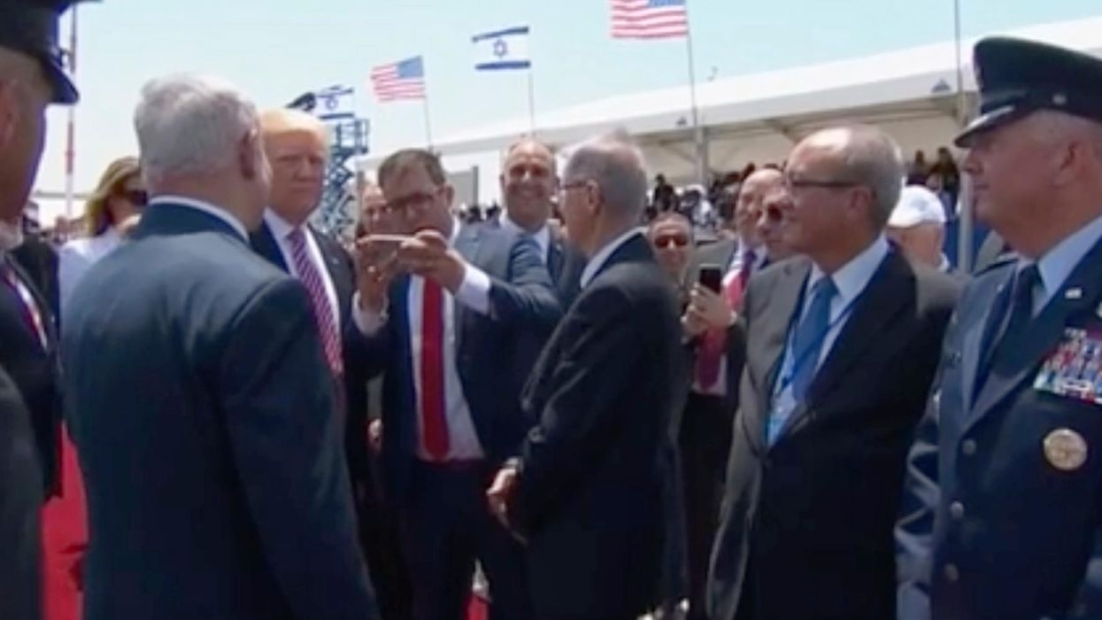 Donald Trump was forced to take a selfie with Israel’s most controversial MP and looked furious