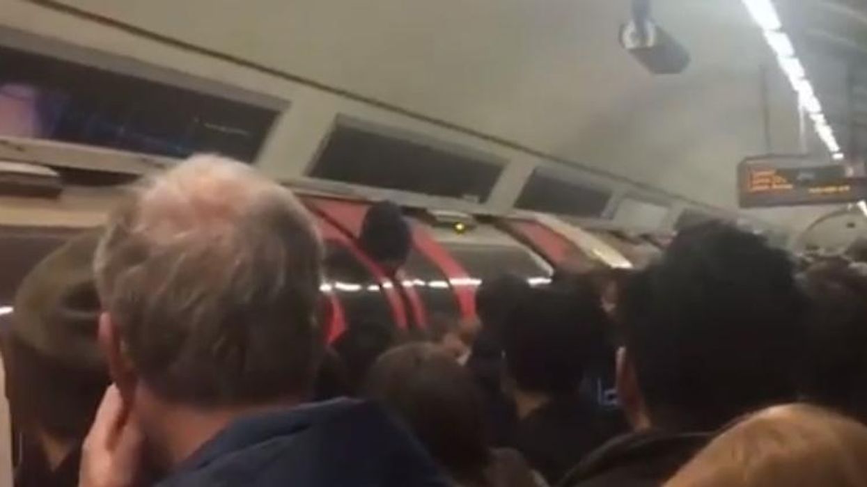 London Tube worker gets head stuck in train doors during rush hour