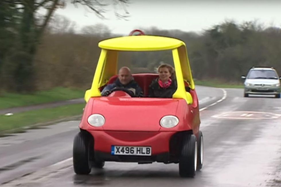this super-narrow electric car looks like an odd adult-sized toy
