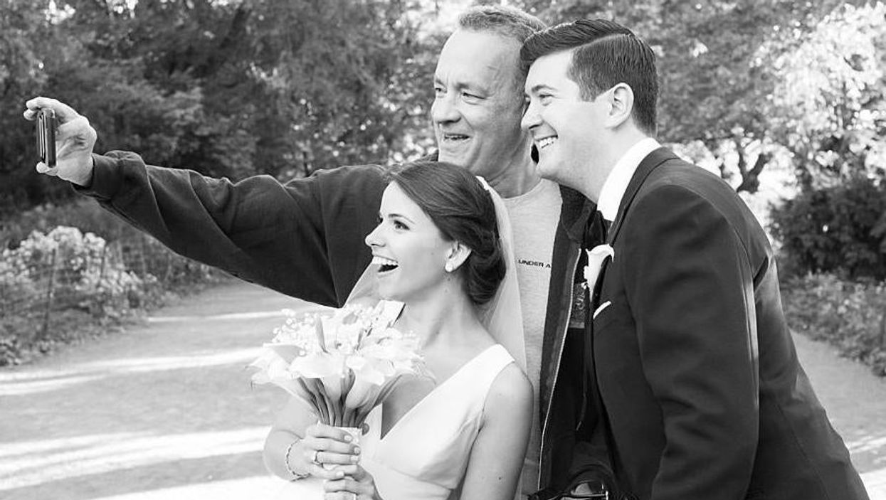 Tom Hanks photobombed a wedding, but the video is even better
