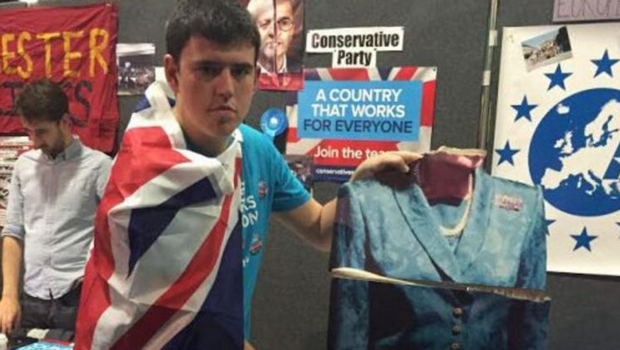 Someone ripped the head off a cardboard Maggie Thatcher and this young Tory is really sad
