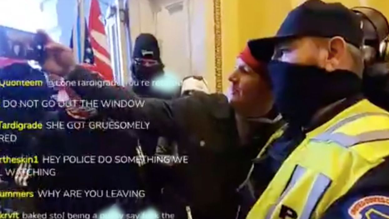 ‘Disgusting’ footage appears to show police officer ‘taking selfie’ with rioter inside the Capitol