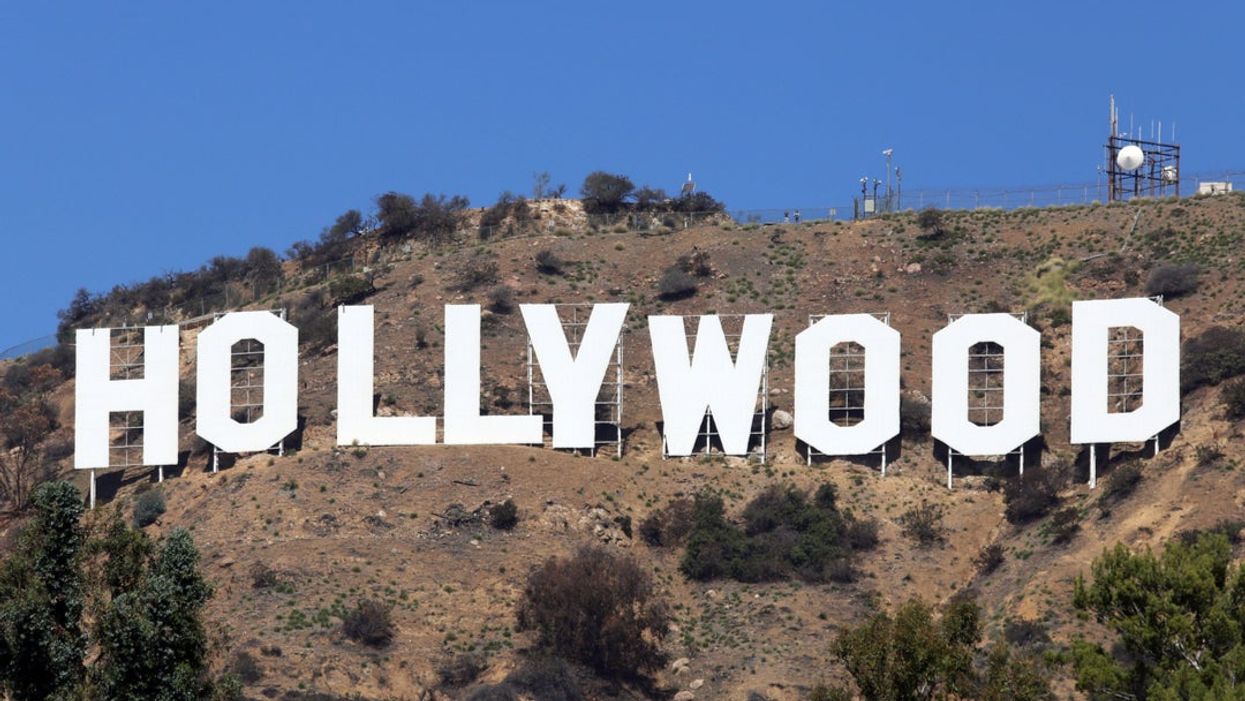 Six people arrested after changing the Hollywood sign to ‘Hollyboob’ to raise breast cancer awareness
