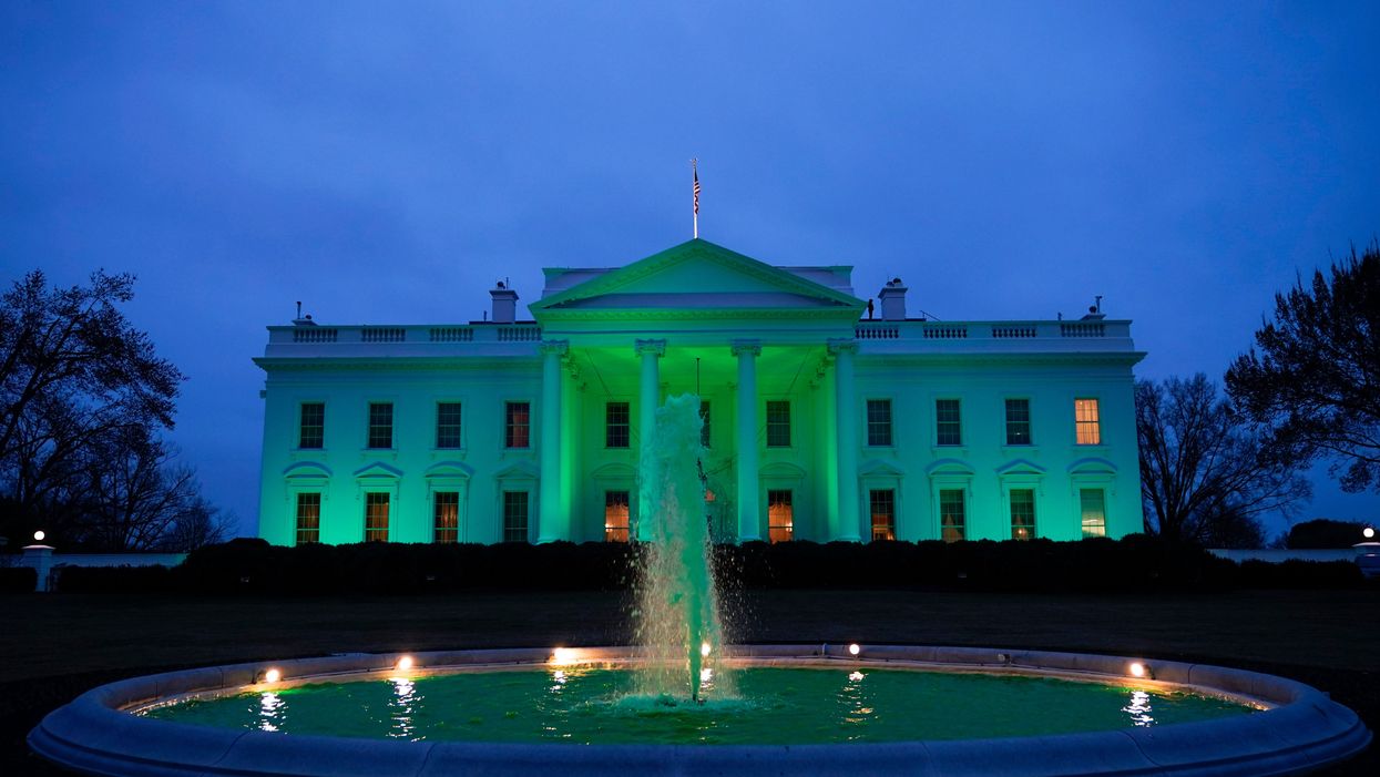 QAnon conspiracists believe the White House’s green St Patrick’s Day light was a secret message