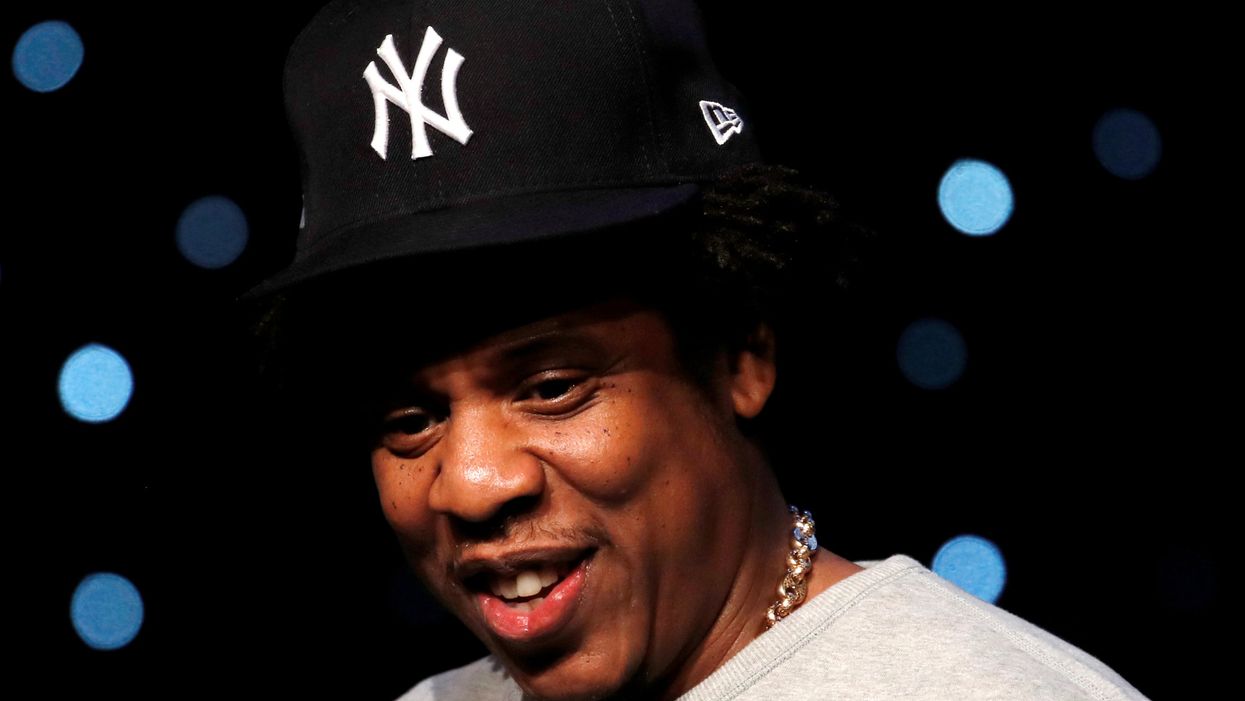 Jay-Z criticised after being pictured in a mosque t-shirt