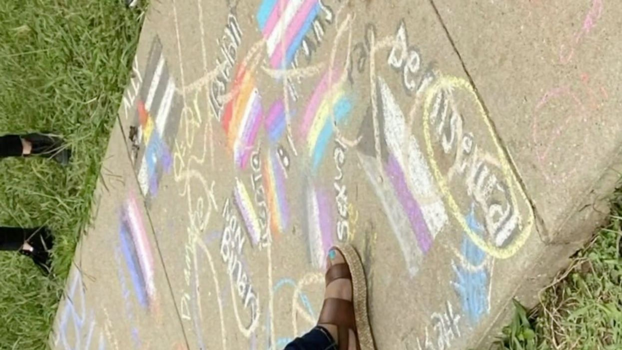 Teacher filmed scrawling ‘heteros rule’ over students’ Pride drawings