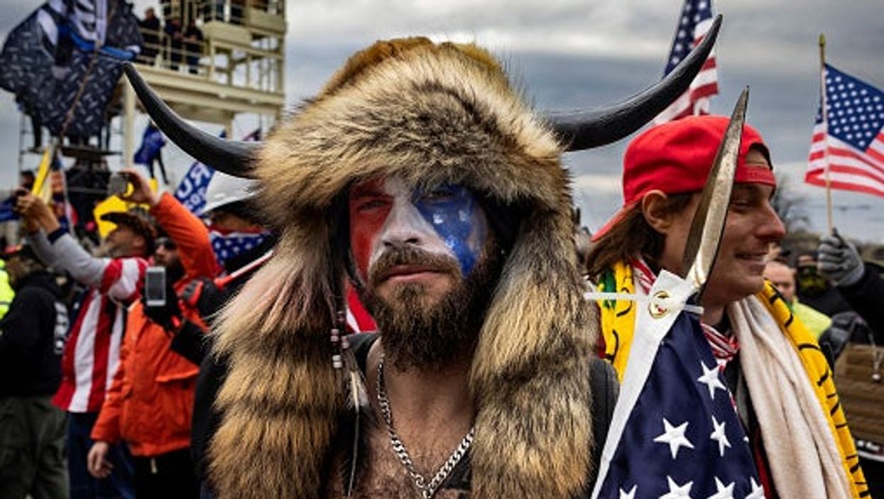 ‘QAnon Shaman’s’ own lawyer says accused conspiracy theorists are ‘people with brain damage’