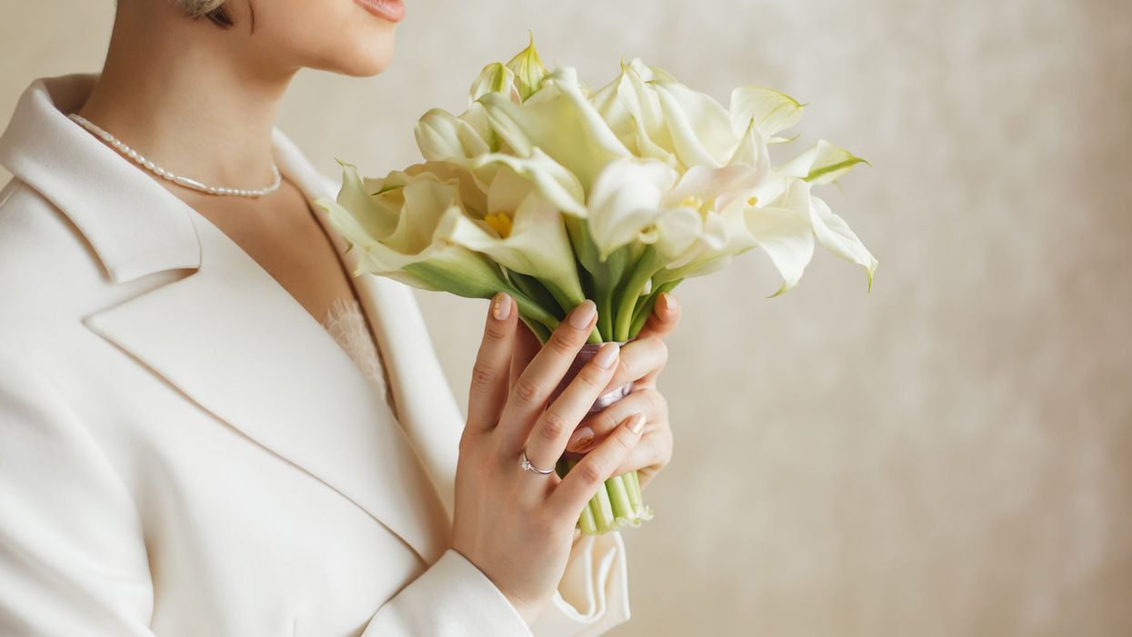 Bride divides opinion after asking non-binary sibling to choose dress or suit for wedding day