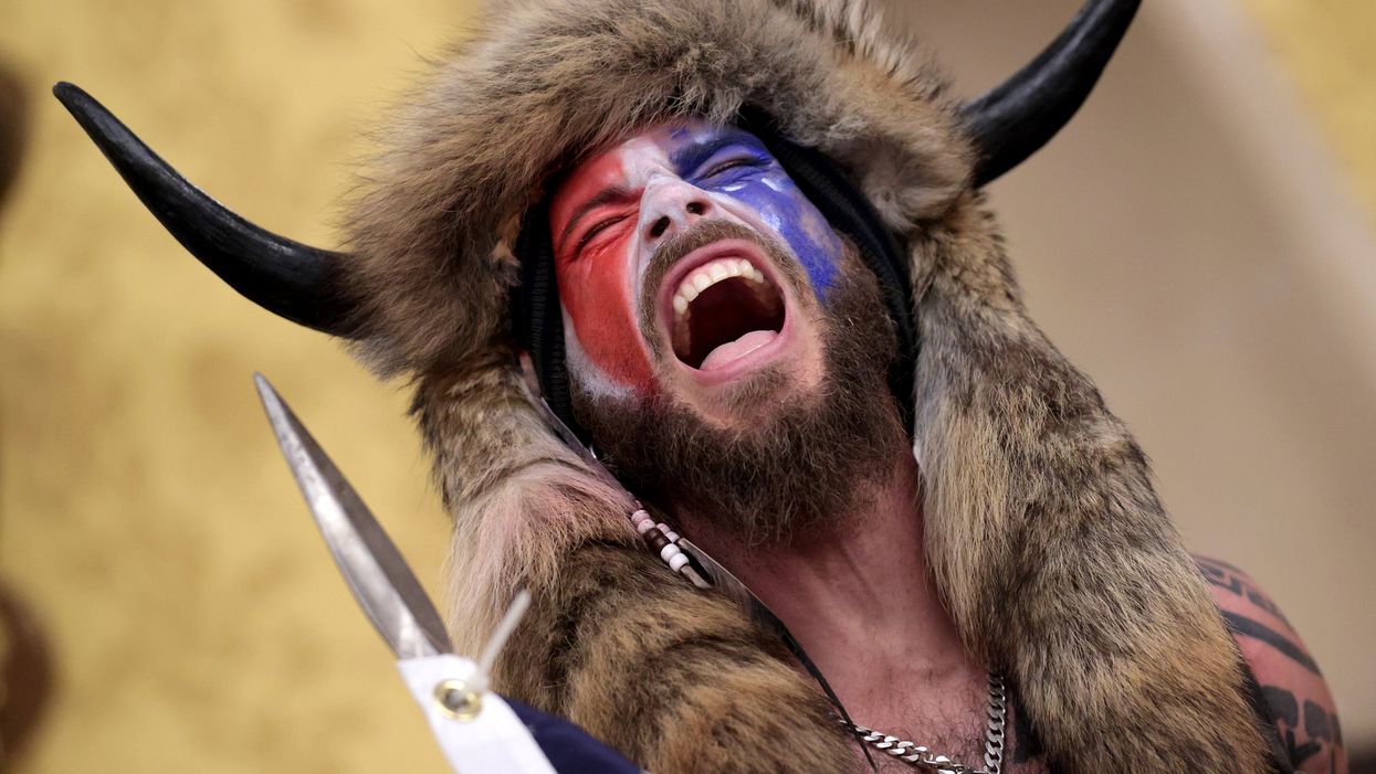 QAnon Shaman’s defence lawyer says he tried to stop someone stealing muffin during Jan 6 insurrection