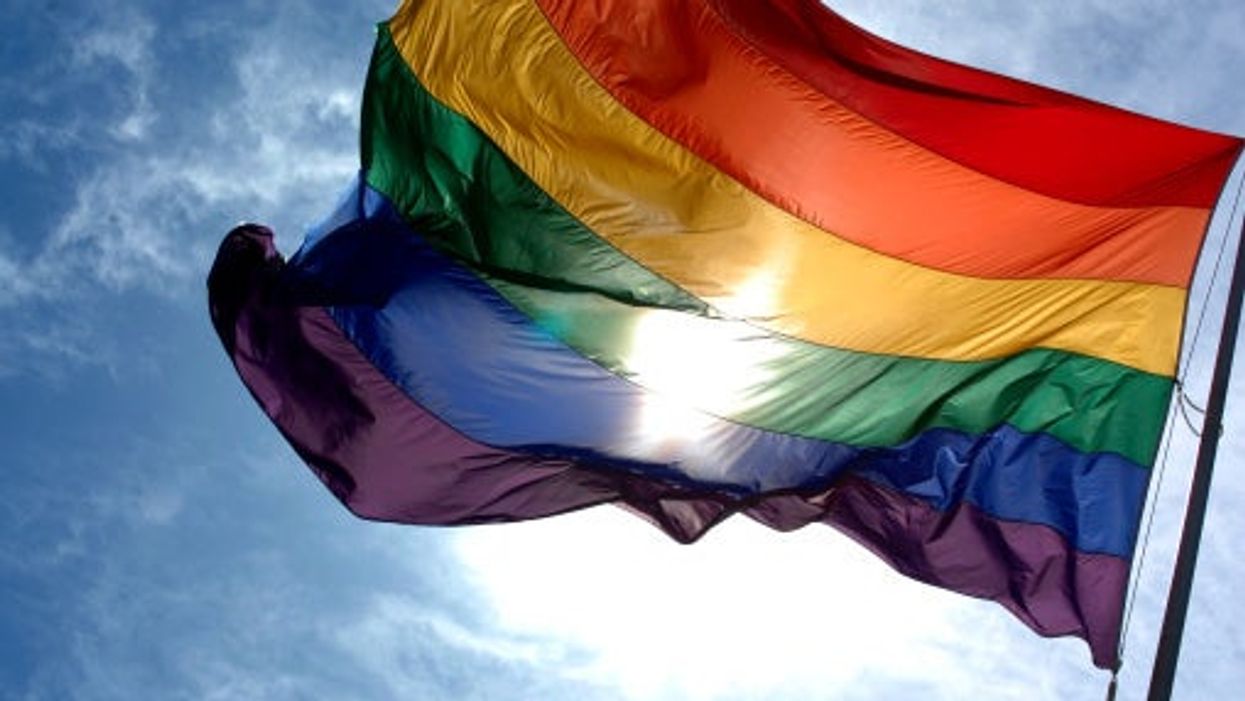 Neighborhood association banned LGBTQ+ flag - so homeowner lit up his entire house