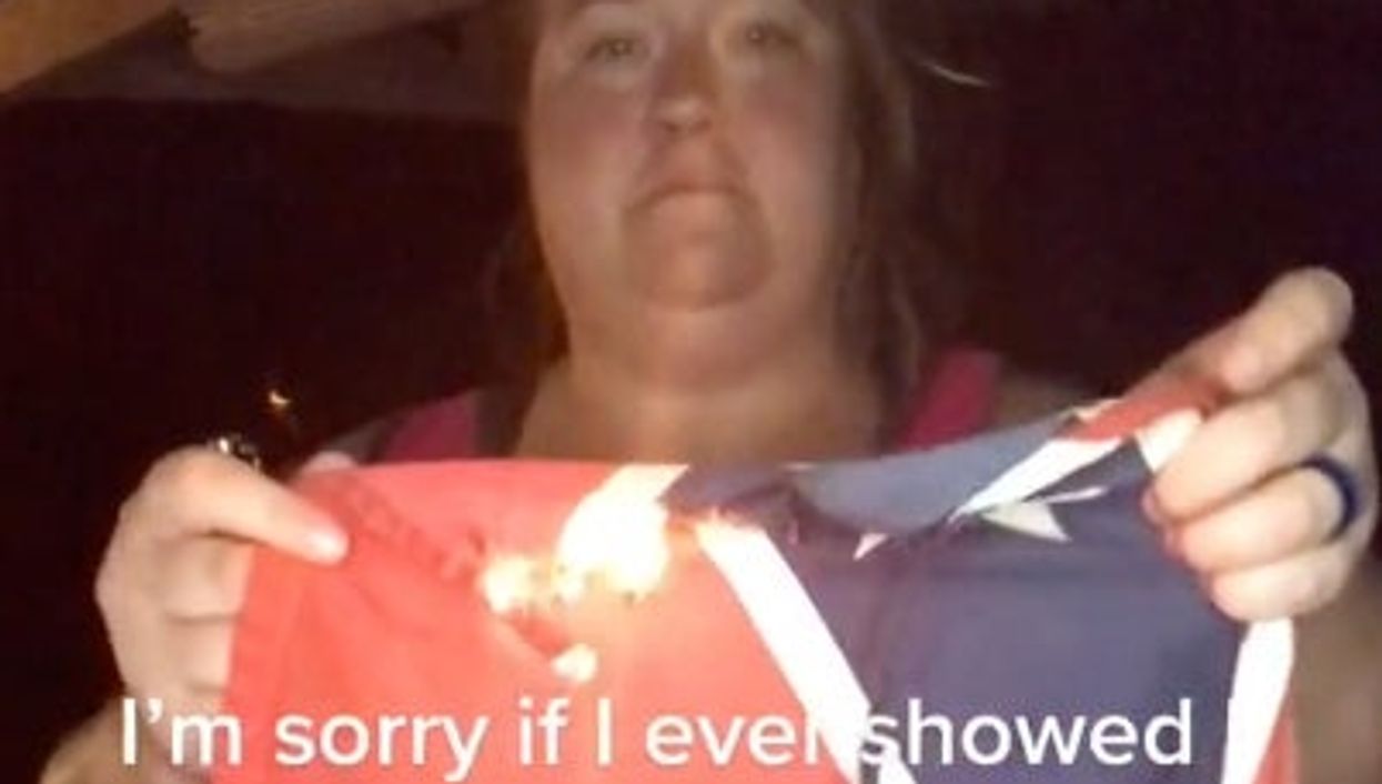 Woman burns Confederate flag after finding out it’s racist