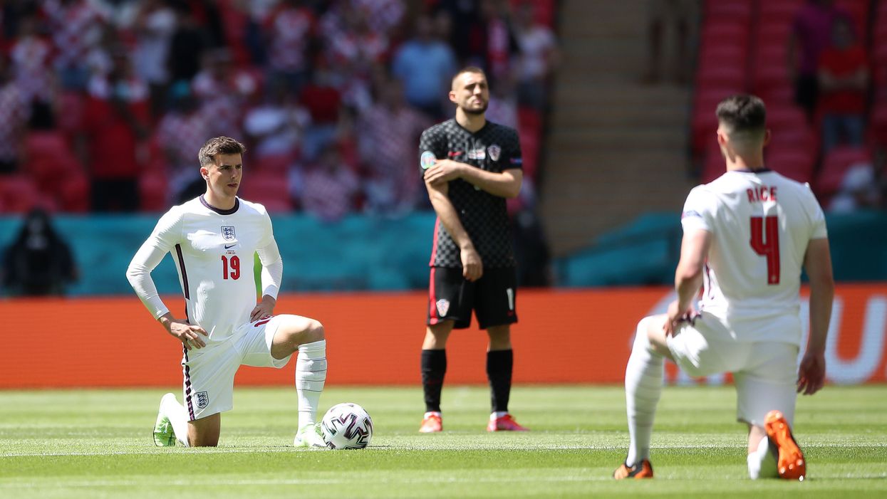 Mixed emotions as some England fans choose to boo the taking of the knee while many applaud