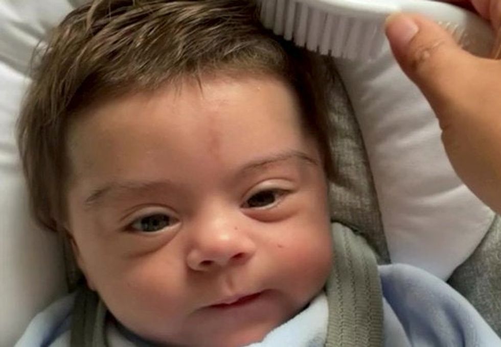 Baby boy born with thick brown hair becomes a social media star | indy100
