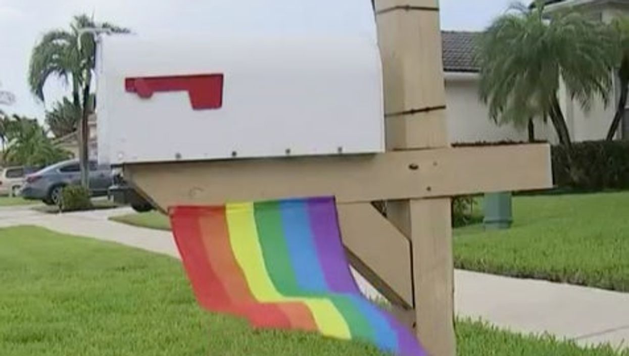 Gay couple threatened with daily fine for flying tiny Pride flag outside home in Florida