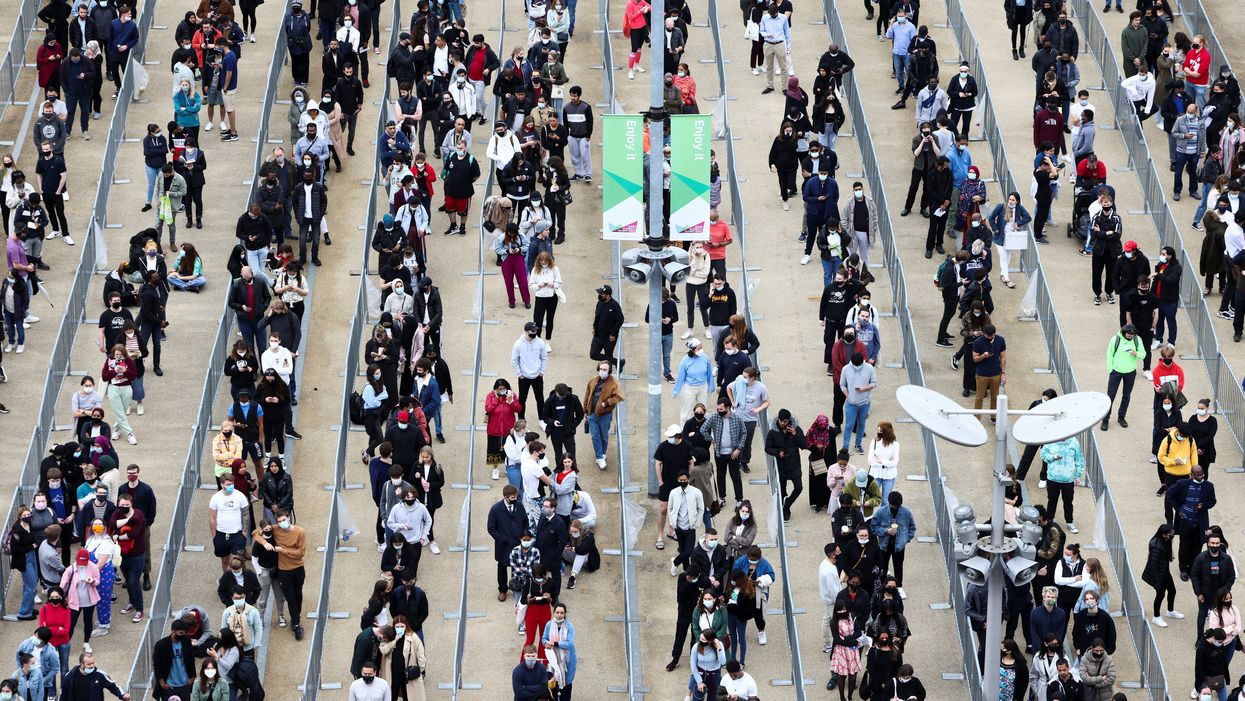 Look away anti-vaxxers: thousands queue to get Covid jab at pop-up clinics in major vaccine push