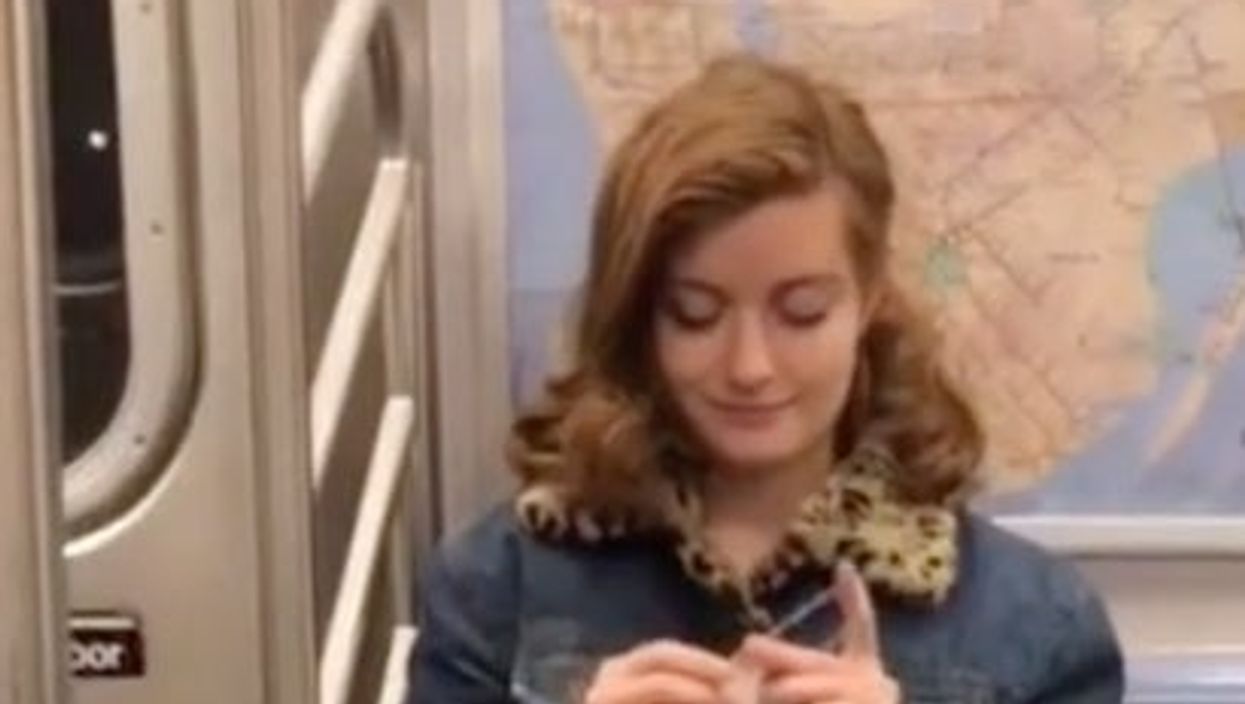Bride knits her own wedding dress on commute to work - and finishes it day before
