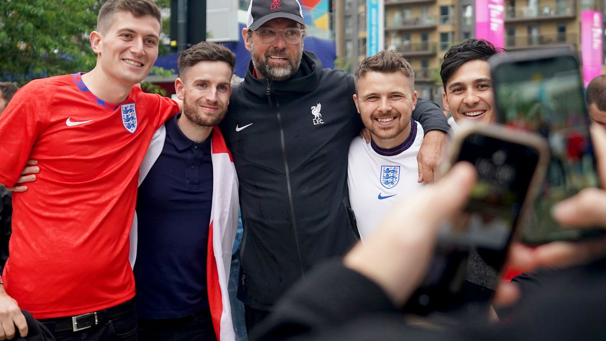 Some think England fans were partying with Jurgen Klopp... but all is not as it seems