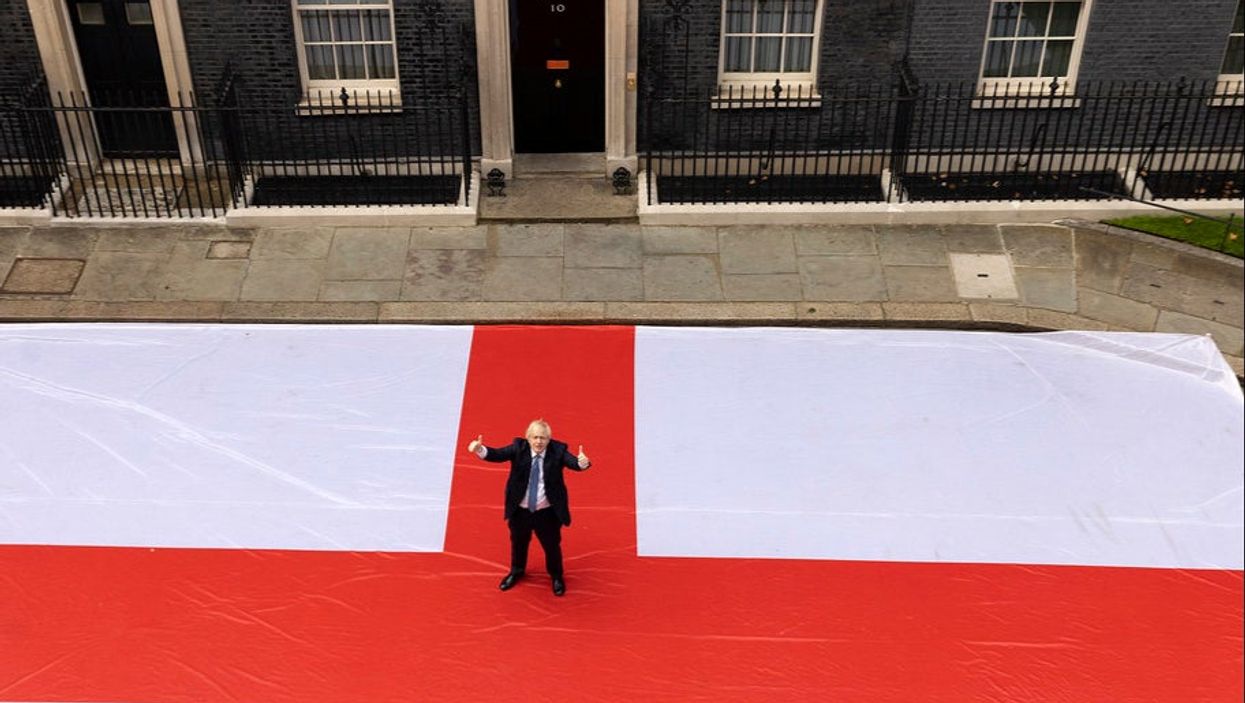 Boris Johnson roasted after posing with giant England flag ahead of quarter-final match