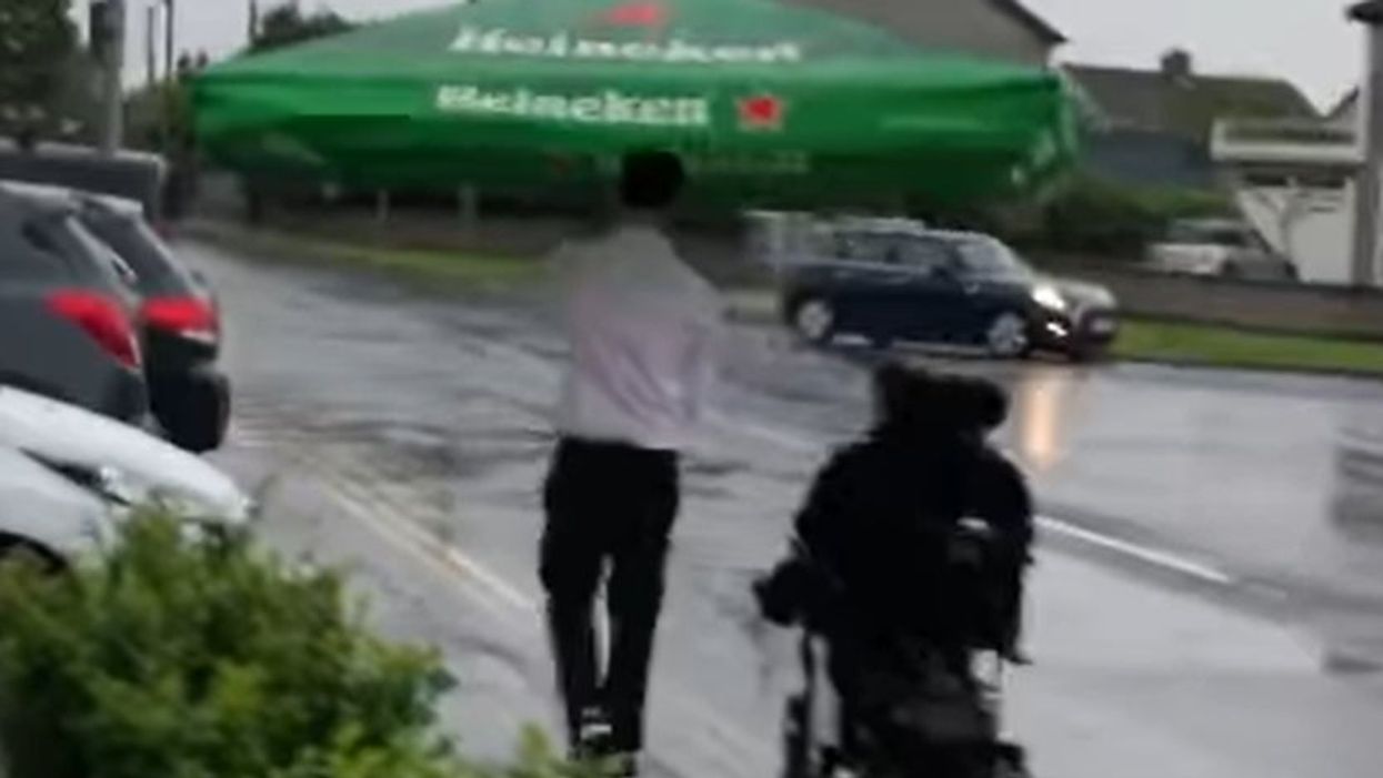 Barman praised as ‘true gentlemen’ after using pub umbrella to escort customer home in rain