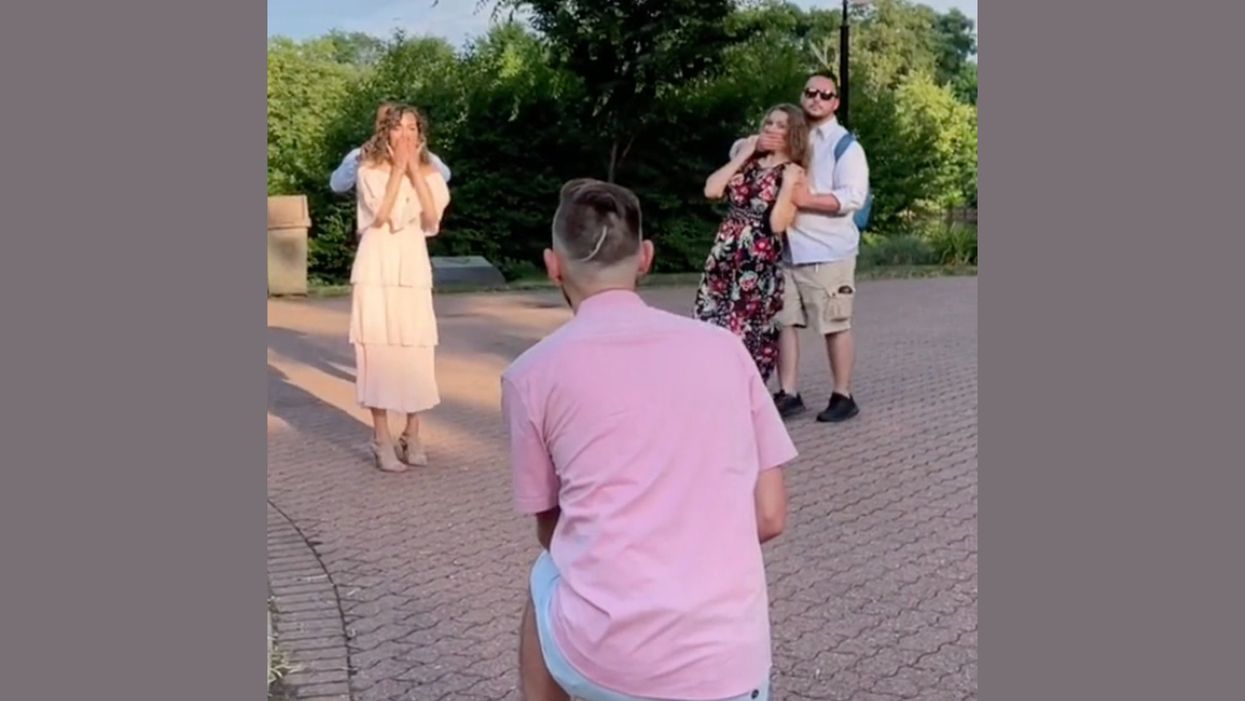 Viral TikTok shows woman literally dragged away from proposal so she doesn’t ruin the surprise
