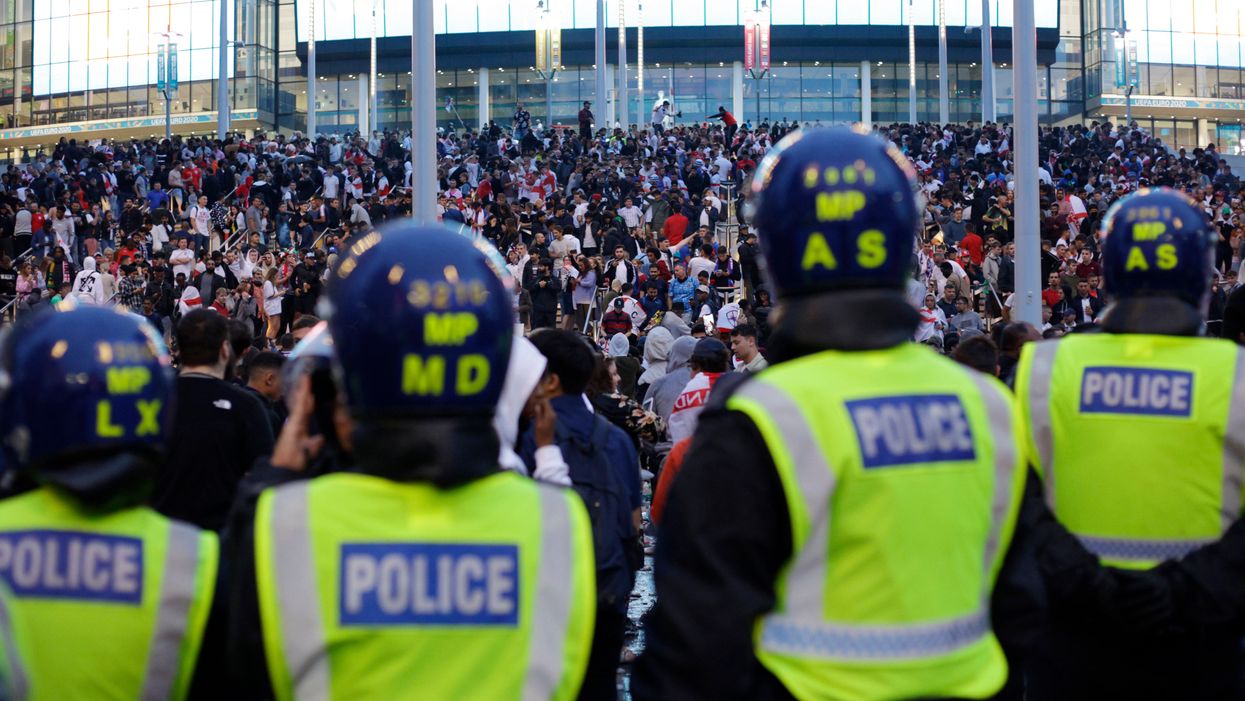Shameful footage shows England fans violently storming Wembley