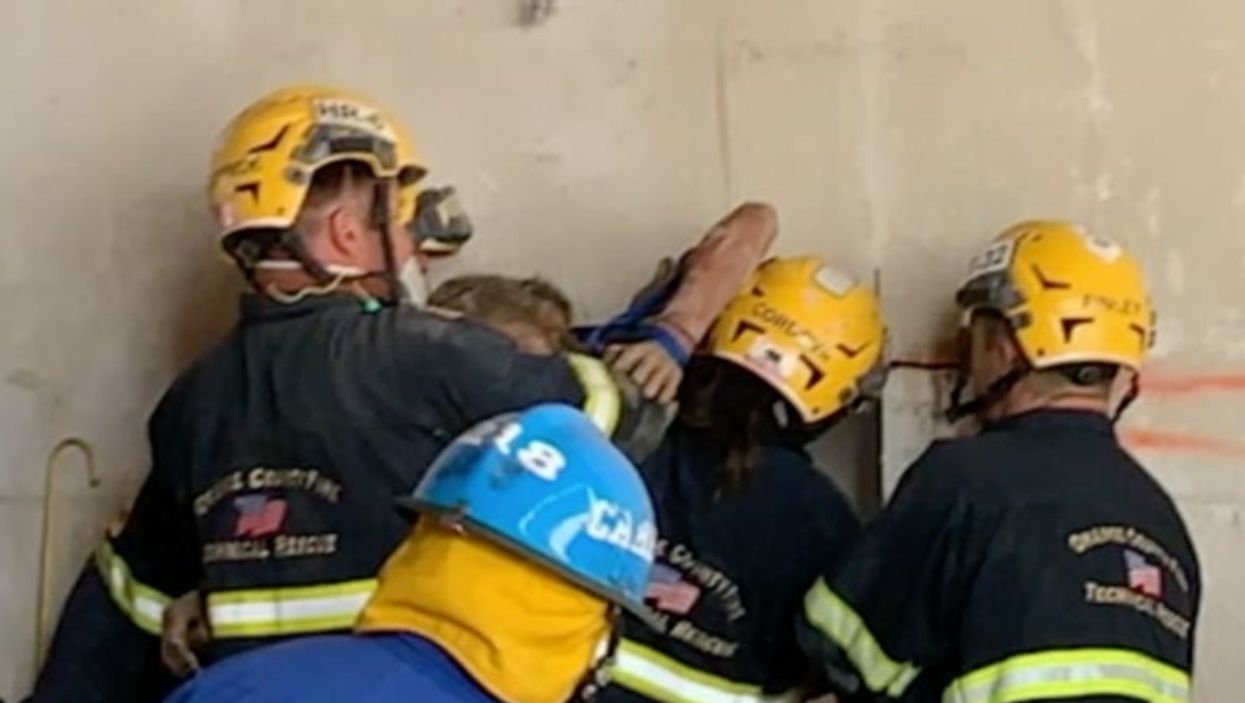 Naked woman gets wedged between two buildings in California prompting major emergency rescue