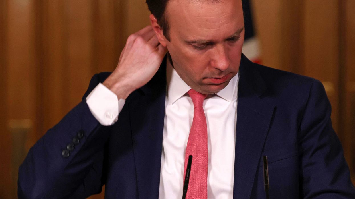 Homes have been raided over CCTV leak of Matt Hancock kissing his aide