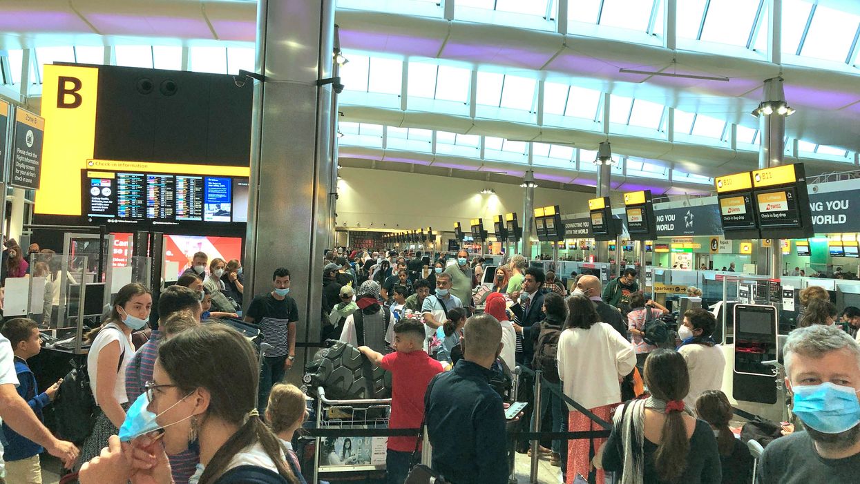 Man tries to pull a sickie - but is fired after being caught having a pint at an airport