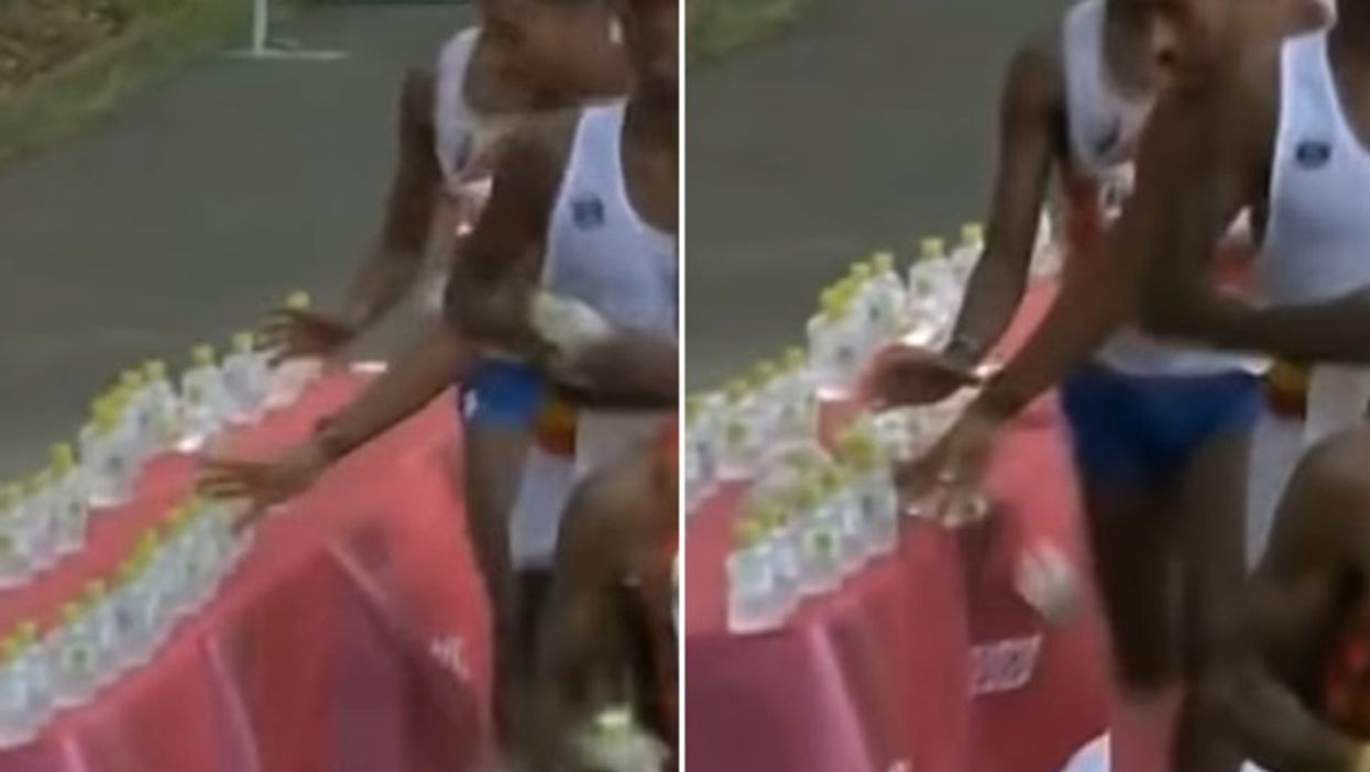 Marathon runner divides web by knocking over dozens of water bottles during race