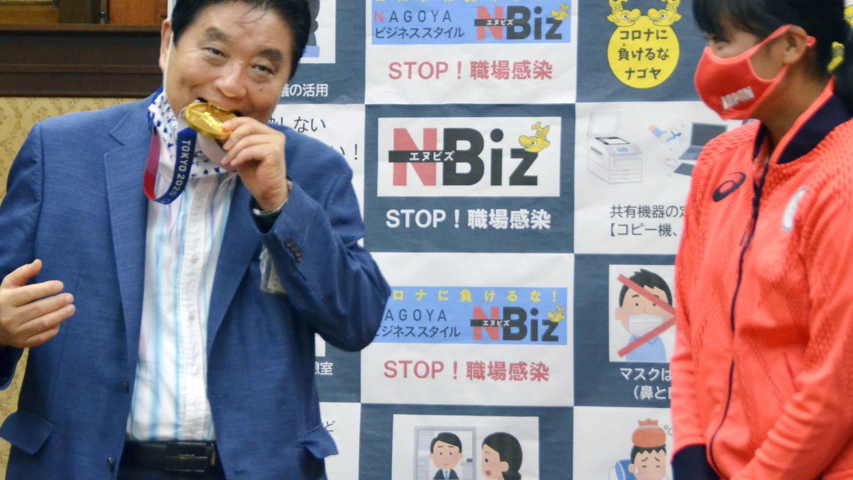 A Japanese Olympian will get a new gold medal after her city’s mayor bizarrely bit into her first one
