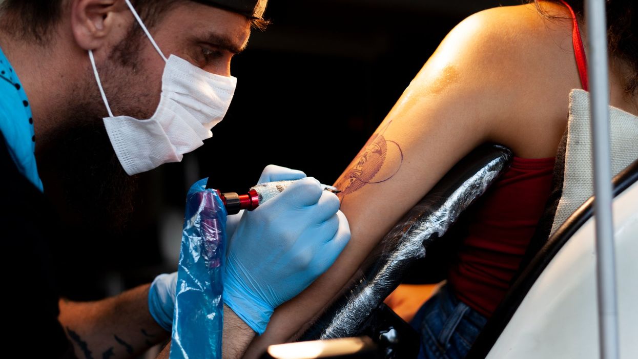 Woman questions if her dog tattoo looks like a penis and people are divided