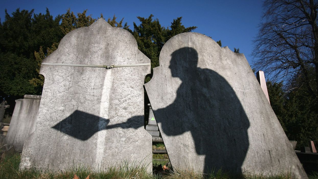 Son defends mother who had ‘adulterer’ carved into her cheating husband’s gravestone
