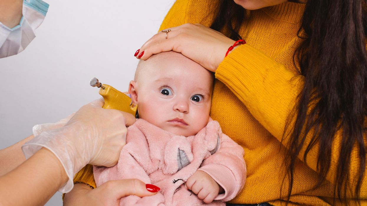 Dad left fuming after wife gets two-month-old daughter’s ears pierced behind his back