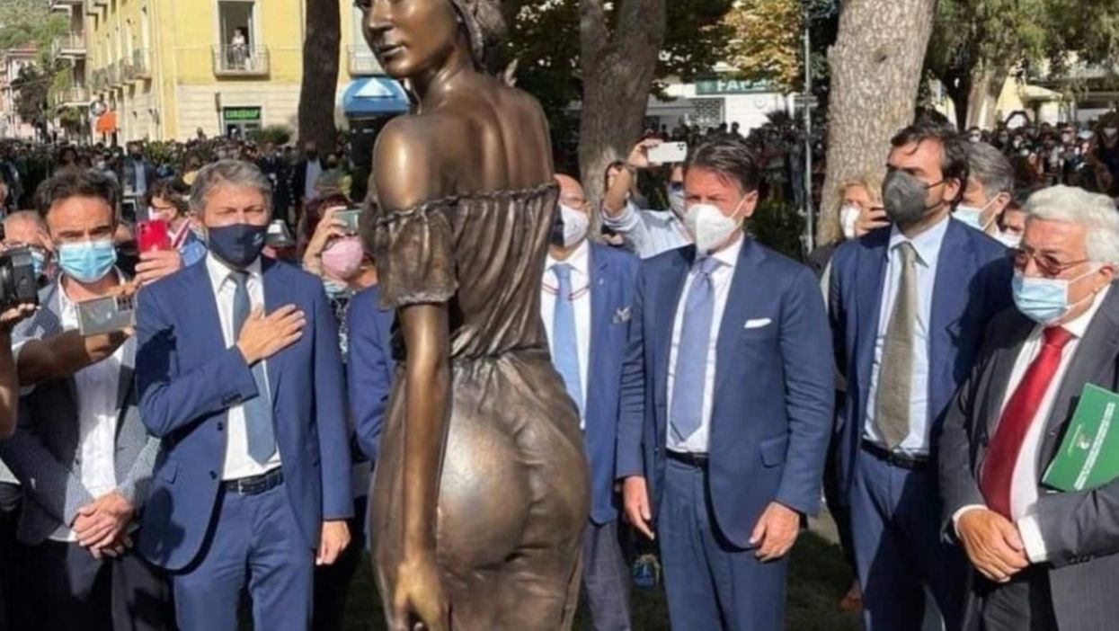 Bronze statue of woman in see-through dress sparks sexism row after it’s unveiled by group of men in Italy