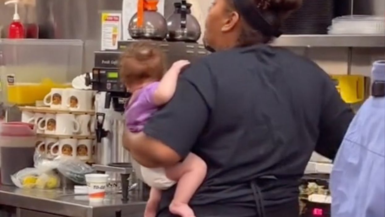 Waffle House worker ridiculed for carrying baby in kitchen reveals heartbreaking backstory