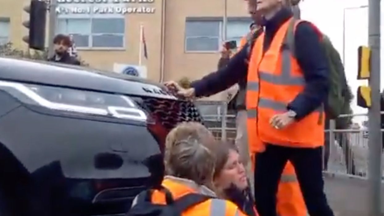 Video shows mum on school run driving into Insulate Britain protestors