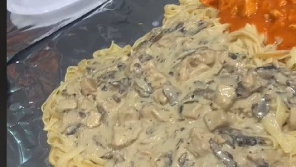 TikTok divided after woman serves up sharing pasta dinner directly to her table