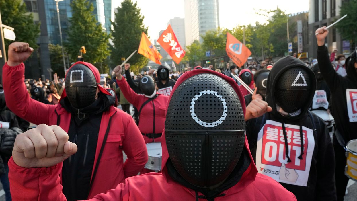 South Korean workers wear ‘Squid Game’ outfits during protest for better work conditions