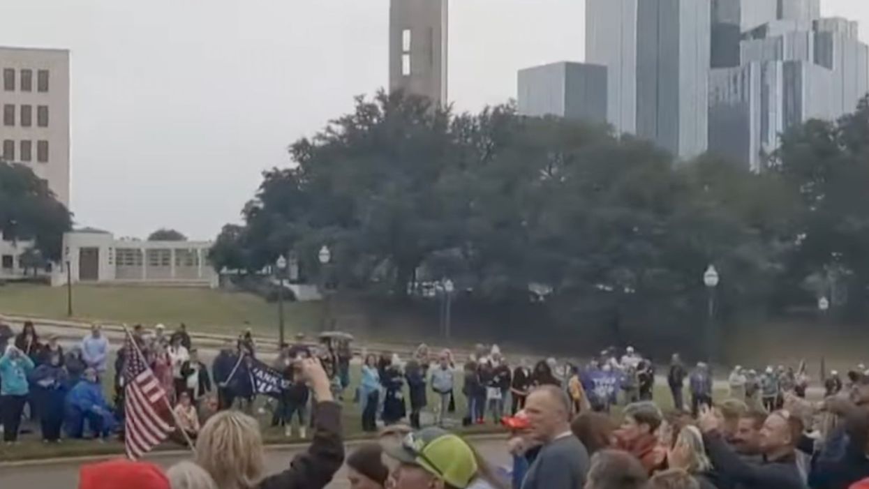 QAnon group saddened that JFK Jr - dead for two decades - did not appear in Dallas on Tuesday