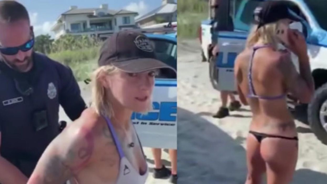 Woman detained by police after being reported for wearing 'revealing' bikini